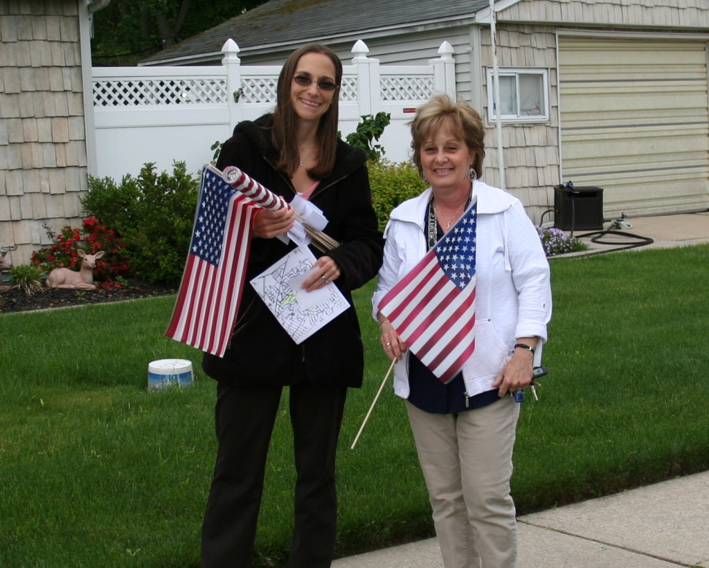 LeaderwithChrisMiro,HicksvilleCivicAssoc.flagcoordinator